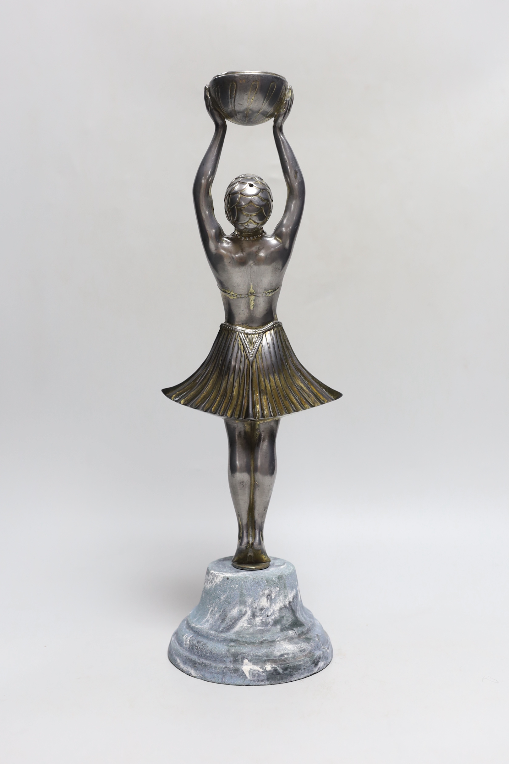 A French Art Deco spelter figure of a dancer, standing on a marble base, 39cm high